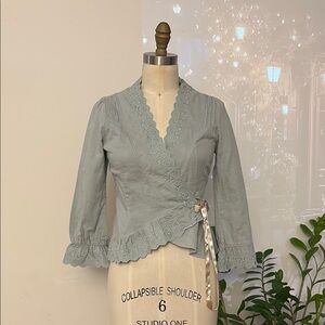 Free People Blue Blouse with Chic Design